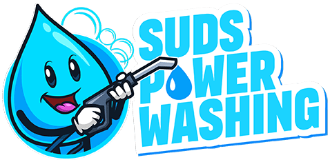 A cheerful cartoon water droplet holding a pressure-washing gun stands next to the bold text "Suds Power Washing," with a water droplet replacing the "o" in "Power." The design, featuring shades of blue and white, gives it a clean and energetic look, emphasizing reliability as if backed by a warranty.