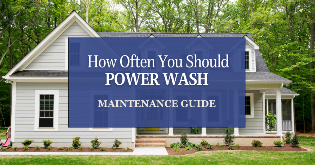 A white house with a front porch is surrounded by trees. Over the image, a blue box reads: "How Often You Should Power Wash - Maintenance Guide.