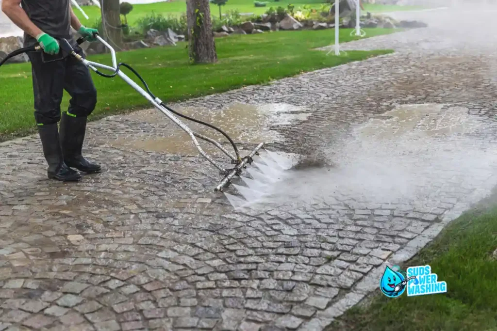 Power washing Pennsylvania — professional cleaning cobblestone driveway with rotary surface cleaner in 2026